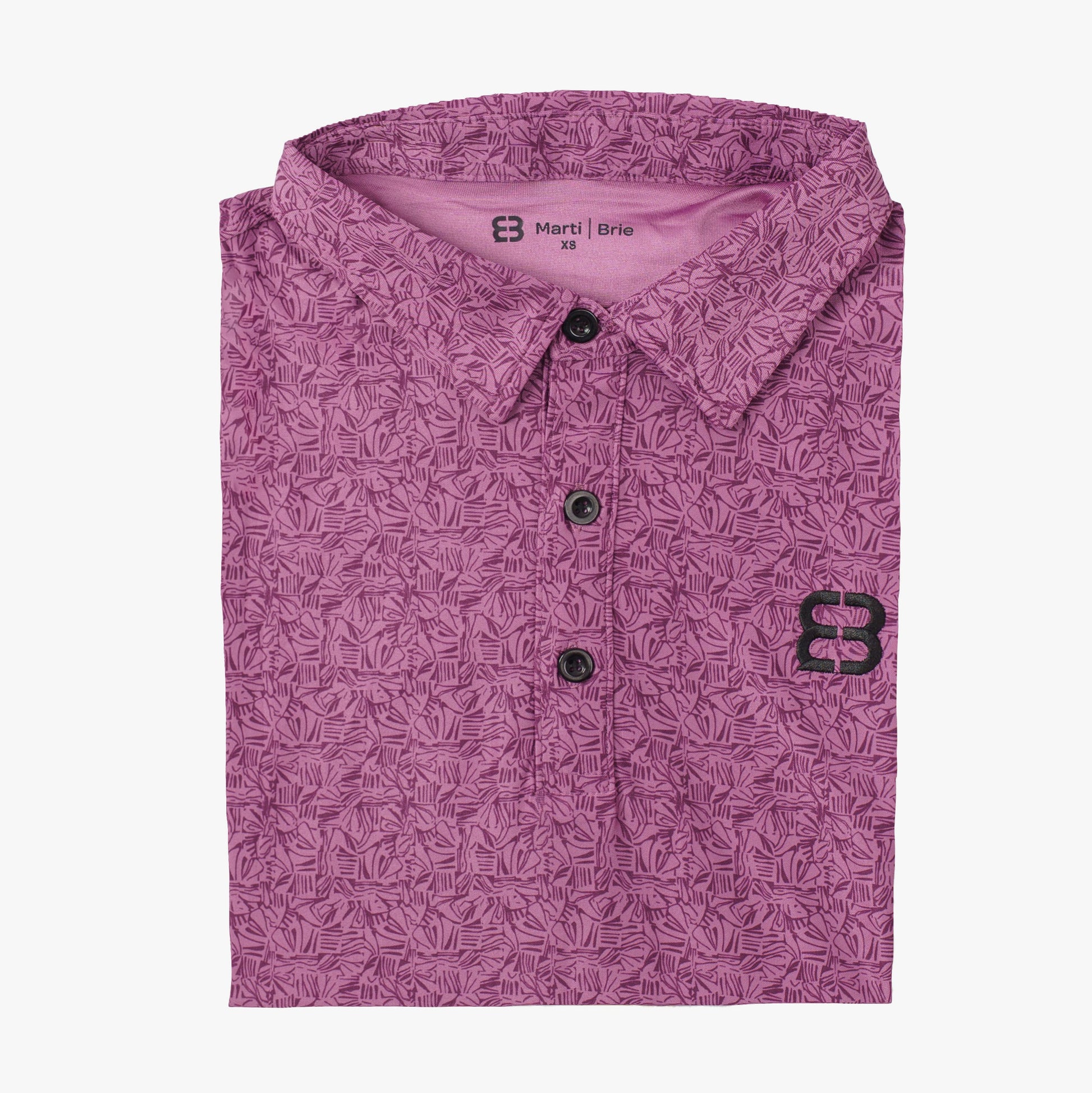 Purple patterned shirt with a marti and brie brand logo on a white background